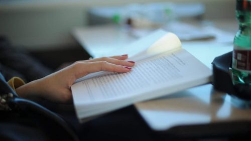 A person holding a book