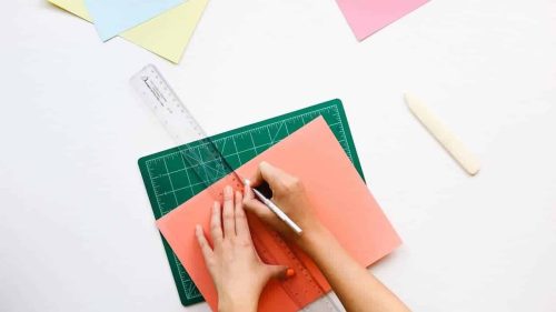 Drawing on colourful paper